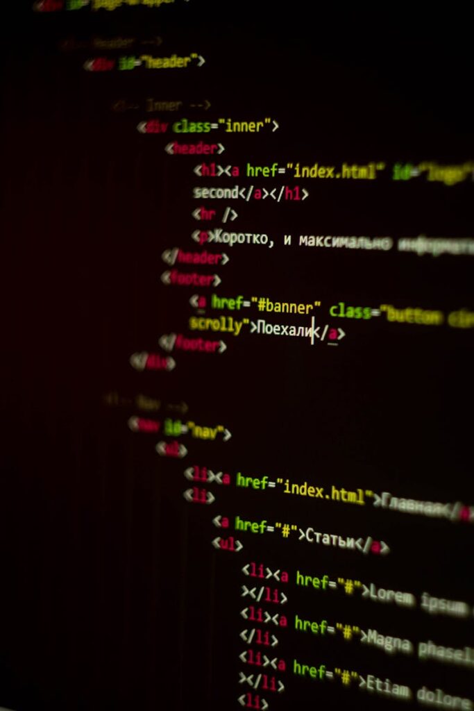 pexels-photo-7107487-7107487 A vertical shot of HTML code displayed on a computer screen with focus on CSS elements.